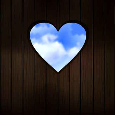 Heart shape cut into wooden door clipart