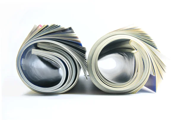 Duas Revistas Enroladas Sobre Fundo Branco — Fotografia de Stock