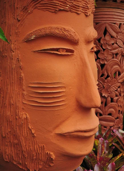 Strict Looking Orange Colored Terracotta Face — Stock Photo, Image