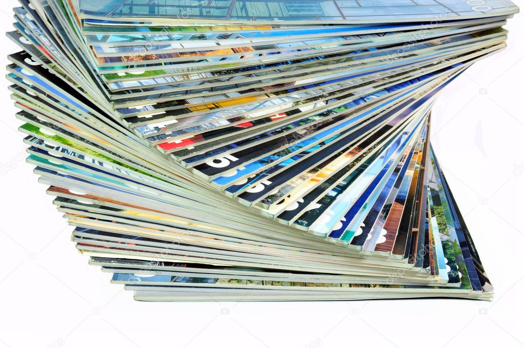 Stack of colorful magazines over white background