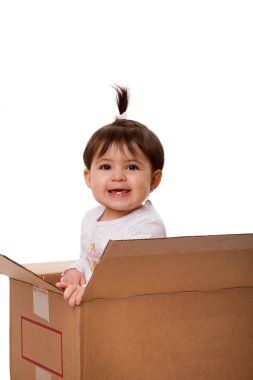 Happy baby in moving box clipart