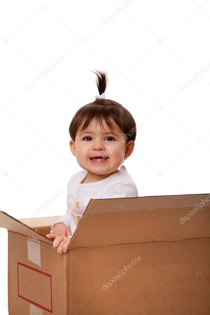Happy baby in moving box
