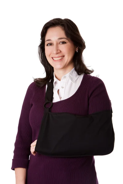 Vrouw met gebroken arm in sling — Stockfoto