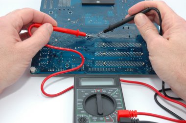 Repairing computer circuit board clipart