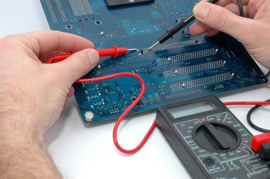 Repairing computer circuit board clipart