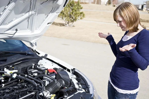 stock image Girl stand by the broken car