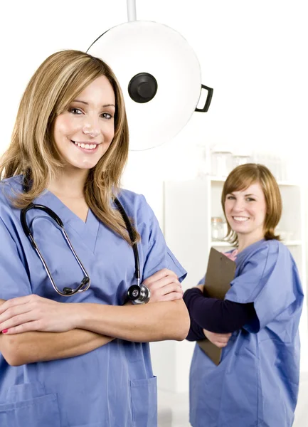 Doctor and nurse in white hospital — Stock Photo, Image