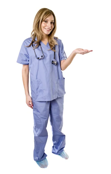 Медсестра указывает пальцем. — стоковое фото