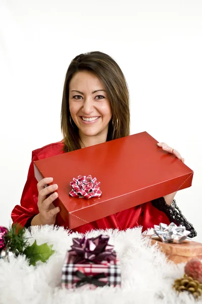 Woman holding christmas present — Stock Photo, Image