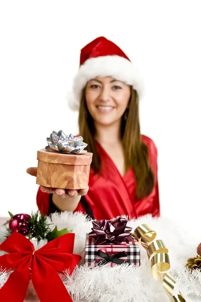 Woman holding christmas present — Stock Photo, Image