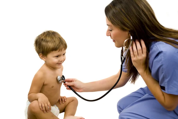Young nurse with a small child — Stock Photo, Image