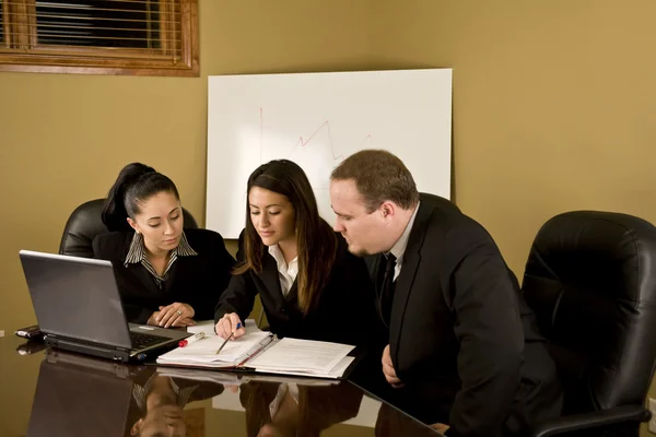 Professionals at a conference table — Stock Photo, Image