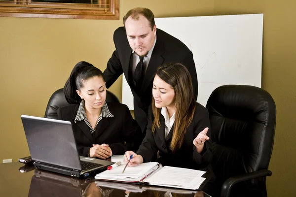 Professionals at a conference table — Stock Photo, Image