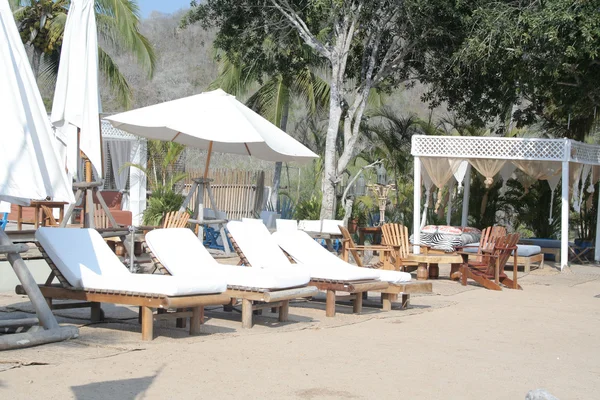 Beach lounge chairs — Stock Photo, Image