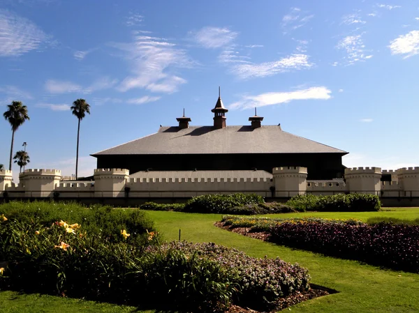 stock image Photo shows part of edifice and part of public garden.