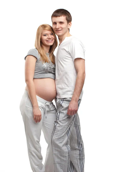 Молодая беременная пара — стоковое фото