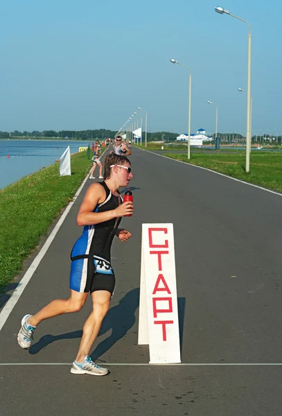 Running stage at thriathlon competitions — Stock Photo, Image
