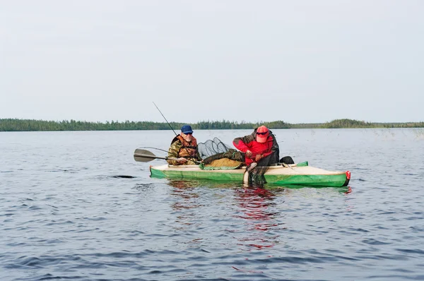 Tourists on a canoe Royalty Free Stock Photos