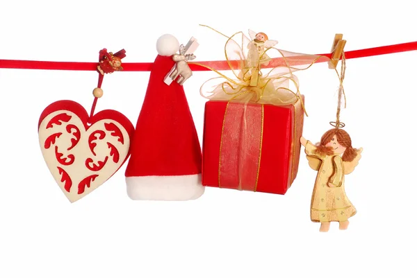 Christmas decoration on clothesline — Stock Photo, Image