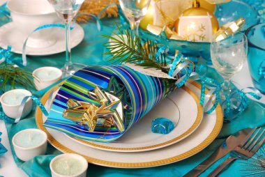 Christmas table decoration in turquoise colors clipart