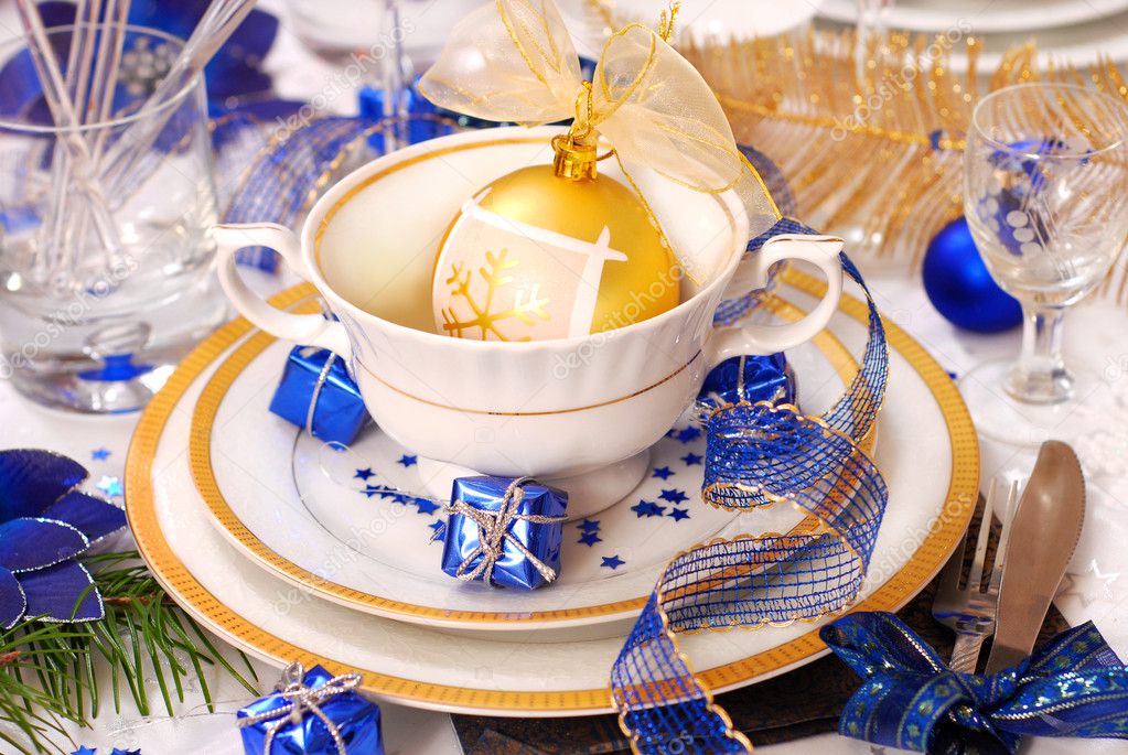 Christmas table decoration in deep blue and white colors