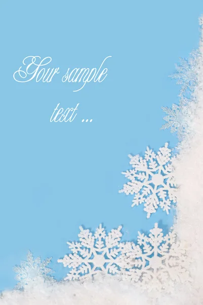 Snowy frame on blue background — Stock Photo, Image