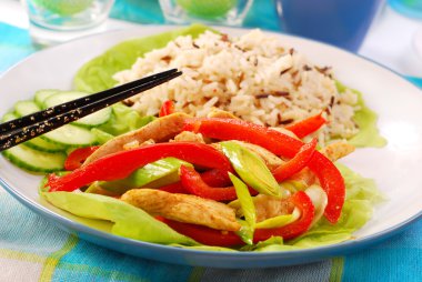 Oriental chicken with vegetables clipart