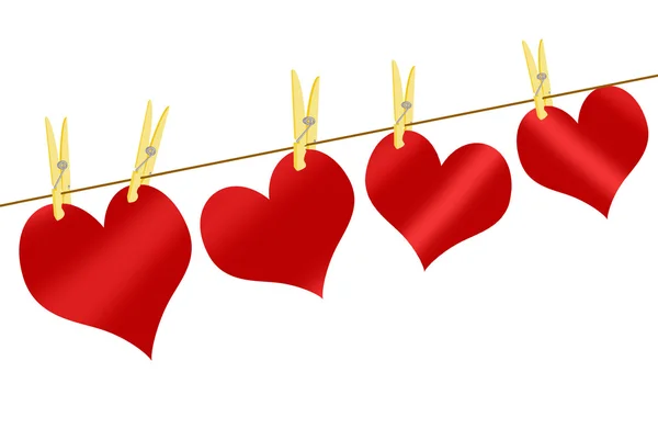 Red hearts on clothesline — Stock Photo, Image