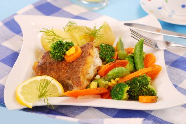 Fried halibut with vegetables for dinner