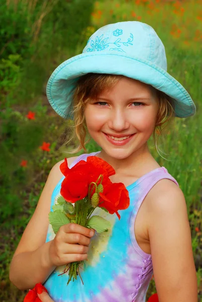 Young girl with bunch of poppy — Stock Photo, Image