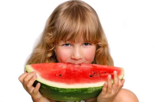 Liten flicka och vattenmelon — Stockfoto