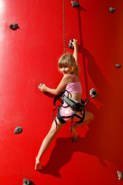 Young girl climbing clipart