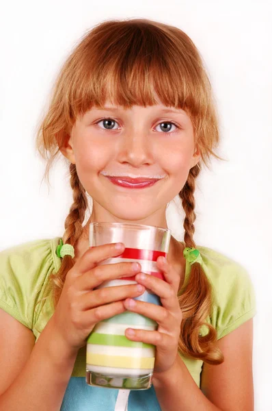 Young girl drinking milk — Stock Photo, Image