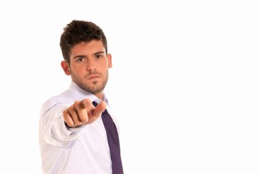 Young businessman pointing to camera with copy-space isolated on white back clipart