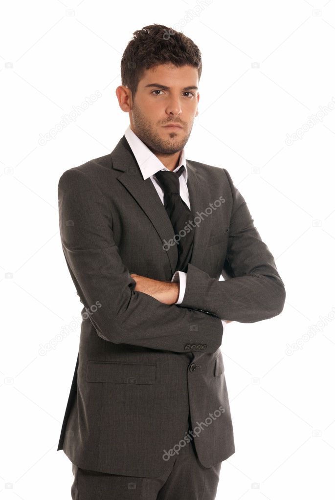 Young businessman looking serious arms crossed isolated on white background