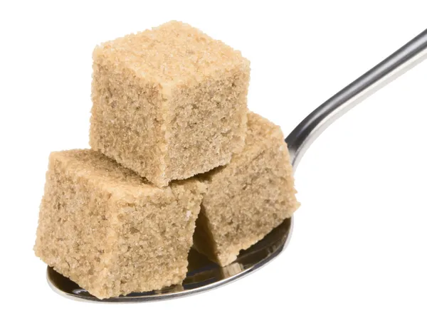 Sugar on spoon — Stock Photo, Image