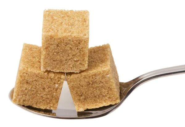 Сахар на ложке — стоковое фото