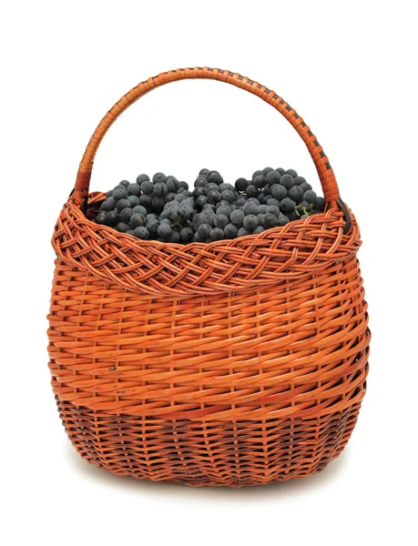 stock image Fresh grapes in a basket, isolated on a white background