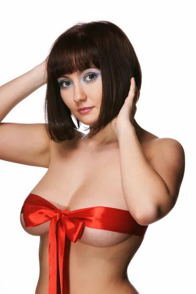 La chica sexy en una cinta roja —  Fotos de Stock