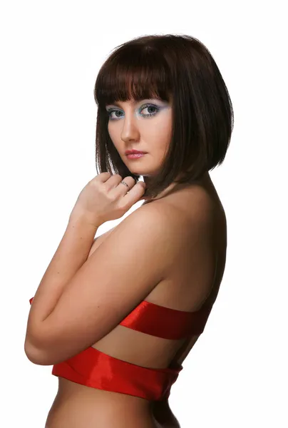 The sexy girl in a red tape — Stock Photo, Image