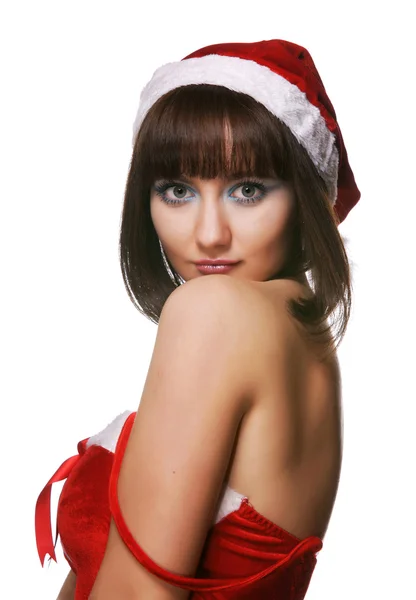Vánoční dívka v červeném klobouku santa — Stock fotografie