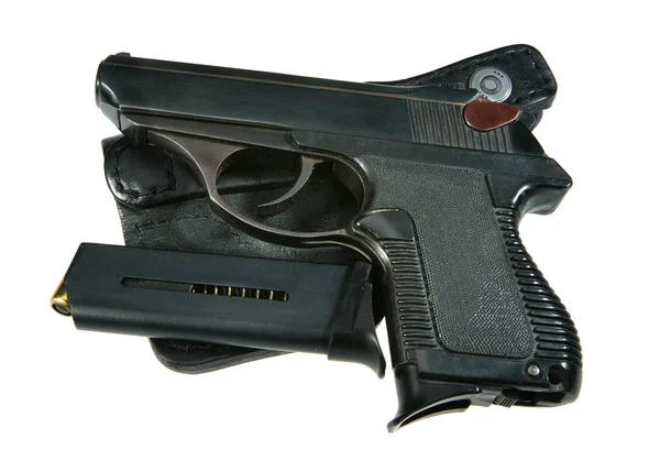 Pistola com balas de borracha - uma foto em um fundo branco — Fotografia de Stock