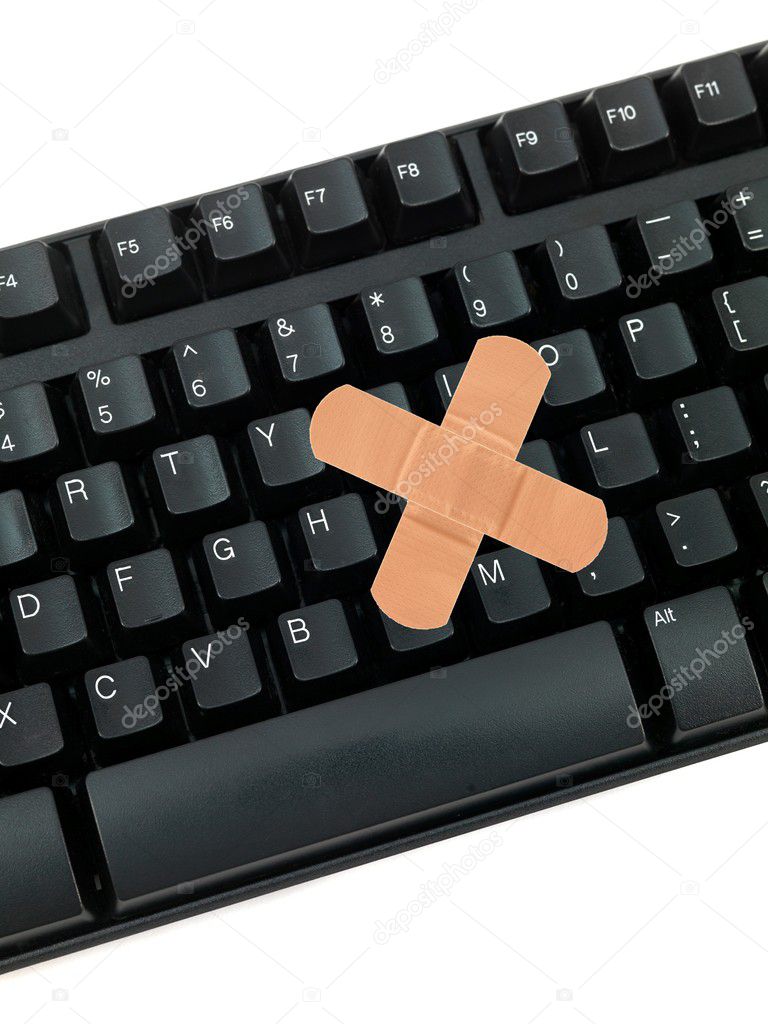 A computer keyboard isolated against a white background