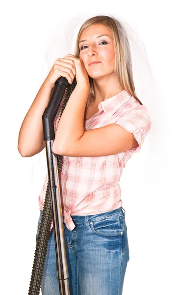 Kvinna i bröllop slöja med vakuum cleane — Stockfoto