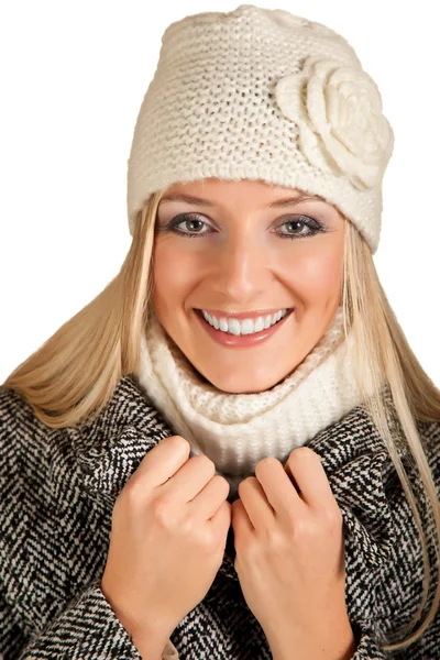 Portrait of beautiful blond woman in warm clothes on blue background — Stock Photo, Image