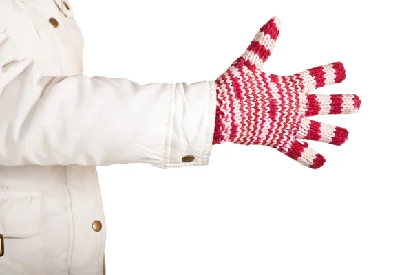Ręka kobiety w kolorowych i ciepłe rękawice na białym tle — Zdjęcie stockowe