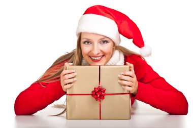 Noel Baba şapkası ile Noel kadında sunar
