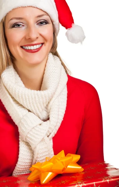 Woman in santa hat with christmas presents — Stock Photo, Image