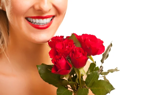 Beautiful caucasian woman with red roses on white isolated backg Stock Photo