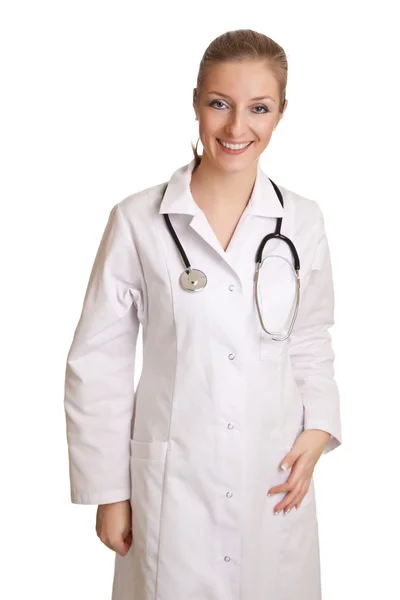 用听诊器孤立在白色制服的医生女人 — 图库照片